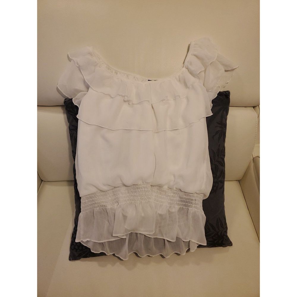 Frilly white top